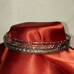 7 silver toned bangle bracelets